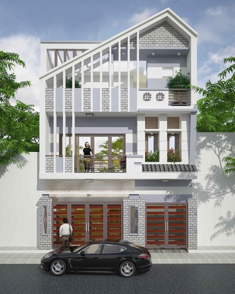 Mặt tiền nhà 3 tầng được ốp gạch mộc và trang trí lam bê tông