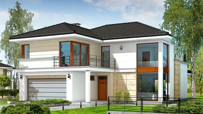 Mẫu nhà này được thiết kế theo hình chữ L độc đáo với phần cửa kính lớn đón ánh nắng cho ngôi nhà