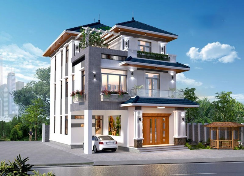 Một góc trái căn nhà được tận dụng làm hầm để xe, phía trên là mặt bằng tầng 2