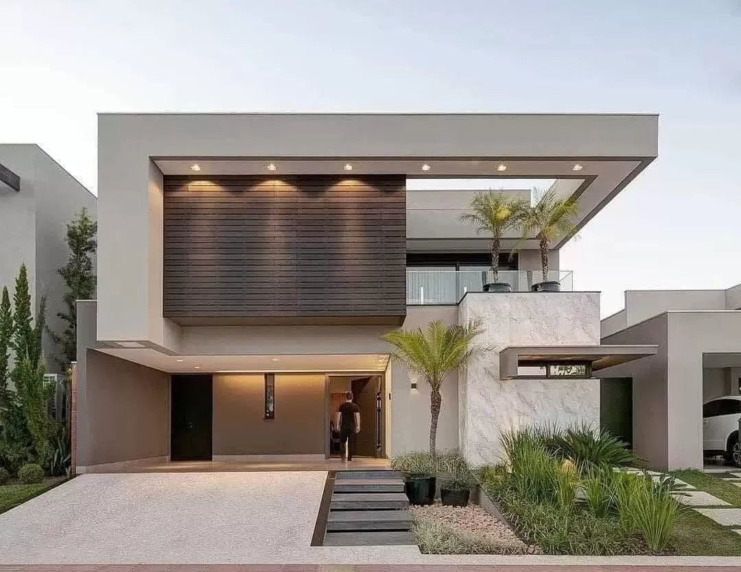 Ngôi nhà được trang trí bởi những bức tường phẳng, đá ốp giả gỗ tạo nét đẹp