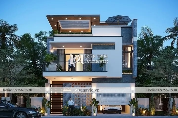 Ngôi biệt thự phố phong cách hiện đại được thiết kết bởi các hình khối, đường nét thể hiện sự cứng rắn, gọn gàng
