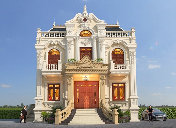 Sắc vàng từ đèn chùm, màu trắng của sơn tường góp phần làm nên vẻ đẹp của mẫu biệt thự cổ điển