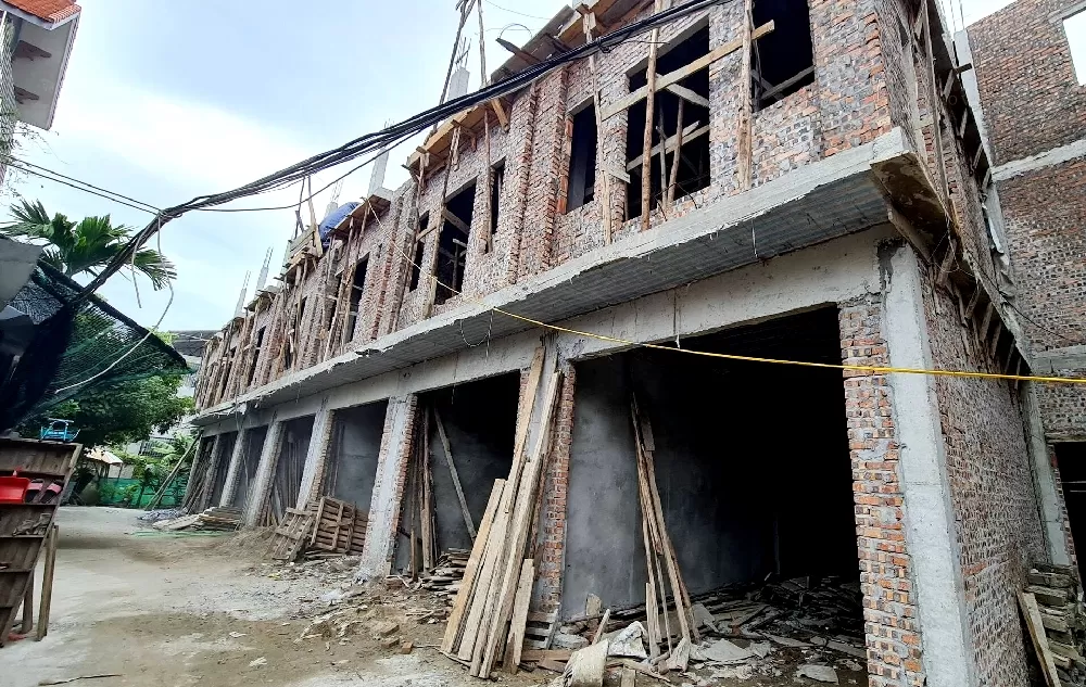 Xây nhà vượt quá sổ đỏ