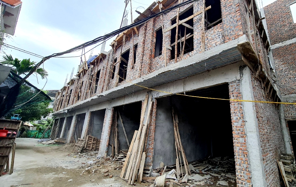 Xây nhà vượt quá sổ đỏ