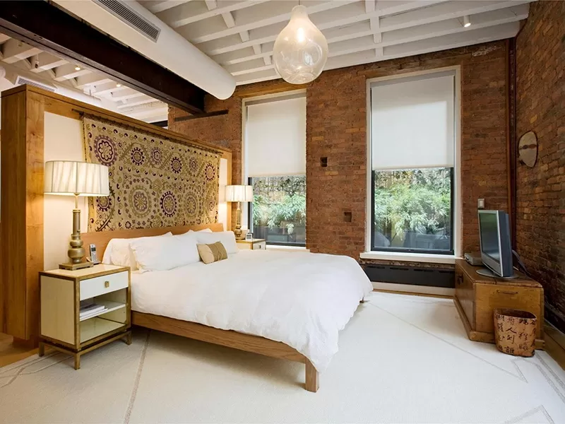 Phòng ngủ thêm ấm cúng nhờ hệ thống gạch xây không trát