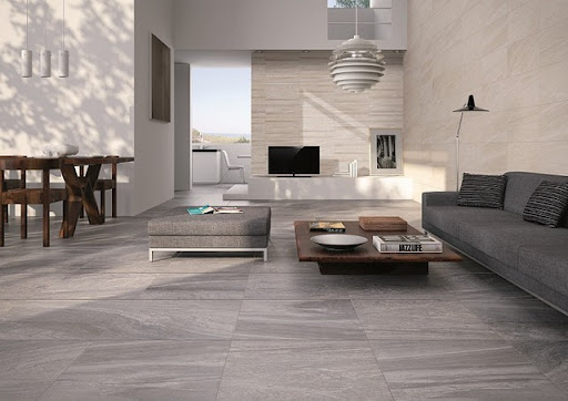 Gạch lát nền màu xám kết hợp màu tường tương phản nâu be tạo không gian rộng rãi