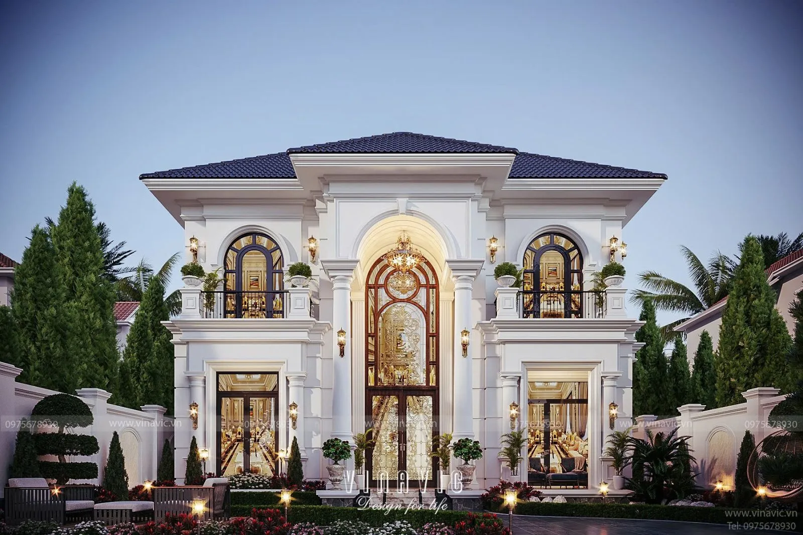 Mặt tiền nhà 2 tầng tinh tế với cột và ban công sắt nghệ thuật