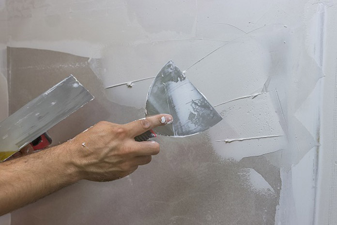 Thi công bả tường lớp 1 (Bả mồi)